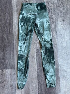 lululemon athletica sage green leggings with white logo tag